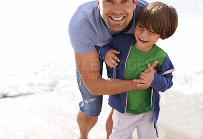 Buy stock photo Father, child or family fun at beach for travel or holiday in summer with a smile, love and hug. A man and kid or son playing and laughing together on vacation at sea with sunshine and happiness
