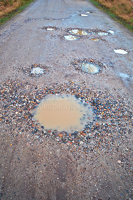 Buy stock photo Water, gravel and rural road with pothole with maintenance, infrastructure and farm transport in winter. Dirt, path and rain puddle in hole on countryside street with damage, ground and nature.