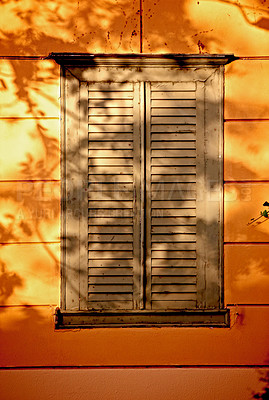 Buy stock photo Vintage, window and wooden doors with home exterior, autumn design or building of wall or texture. Pattern, paint or wood frame of shutters, feature or outdoor house for historic or retro decor 