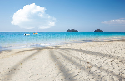 Buy stock photo Ocean, Singapore and blue sky for holiday, sand and rocks in shore for peace and tranquility. Seaside, waves and summer for vacation, location and beach for clear water on travel and tropical trip 