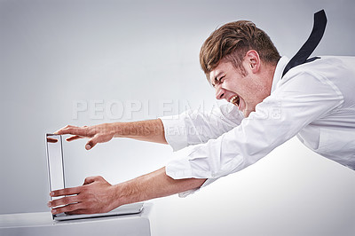 Buy stock photo Laptop, man and scream for burnout, work and stress on mock up in studio on white background. Mental health, computer and businessman for fear as overworked, overwhelmed and frustrated with workload