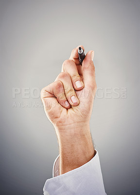 Buy stock photo Hand, marker and writing for drawing, planning and thinking of creative, idea and vision on grey background. Person, hold and pen for brainstorm, workshop and presentation on mockup in studio