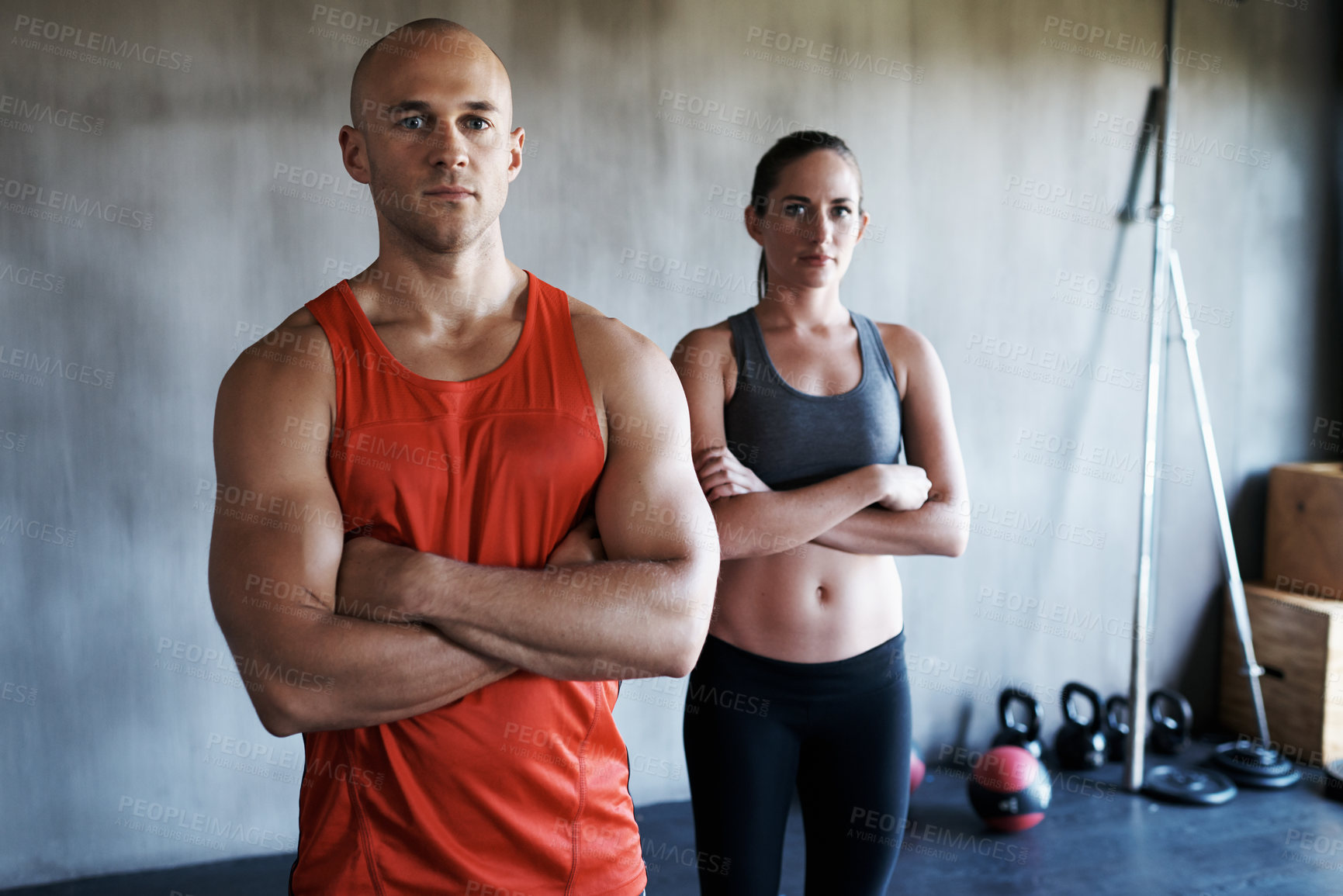 Buy stock photo Cropped shot of a young man and woman in gymwear