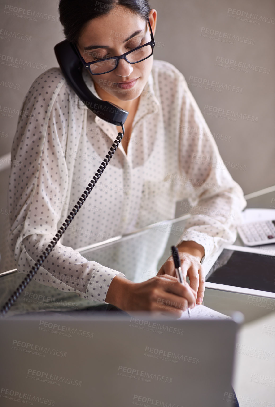 Buy stock photo Telephone, write and female secretary on a call doing research on internet with laptop. Technology, landline and professional corporate receptionist working on project with computer in the workplace.