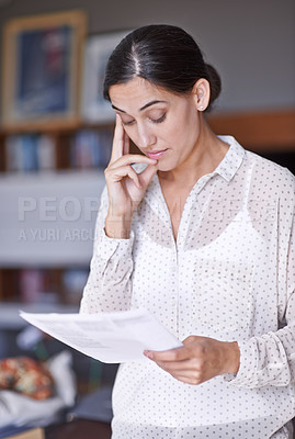 Buy stock photo Stress, document and business woman reading in office for corporate finance data project. Frustrated, doubt and worried professional female financial advisor working with paperwork in workplace.
