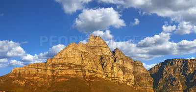 Buy stock photo Mountain, blue sky and sunset with natural landscape for travel location, outdoor adventure and environment. Banner, nature and clouds for peace, explore and holiday destination in Cape Town.