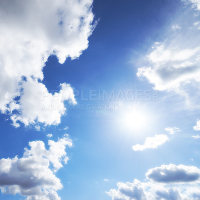 Buy stock photo A beautiful blue sky filled with fluffy white clouds