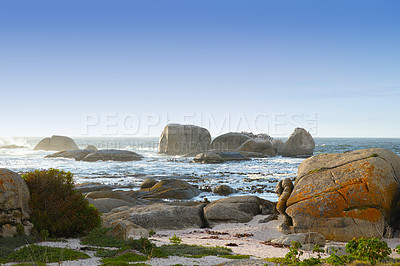 Buy stock photo Nature, landscape and rocks by ocean in South Africa for travel destination, holiday and vacation. Natural background, summer and waves, sea and boulders for scenic view, environment and location