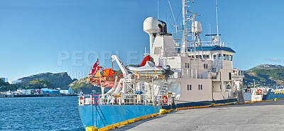 Buy stock photo Ship, water and harbor at sea to coast guard with landscape, blue sky and transportation for emergency sailing. Vessel, dock and ocean with yacht for maritime, danger and patrol in morning and nature