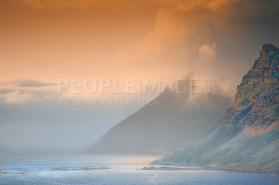 Buy stock photo Mountain, island and ocean with sunset sky, clouds and natural landscape at travel location. Nature, ecology and sustainable environment with earth, sea and tropical holiday destination with color.