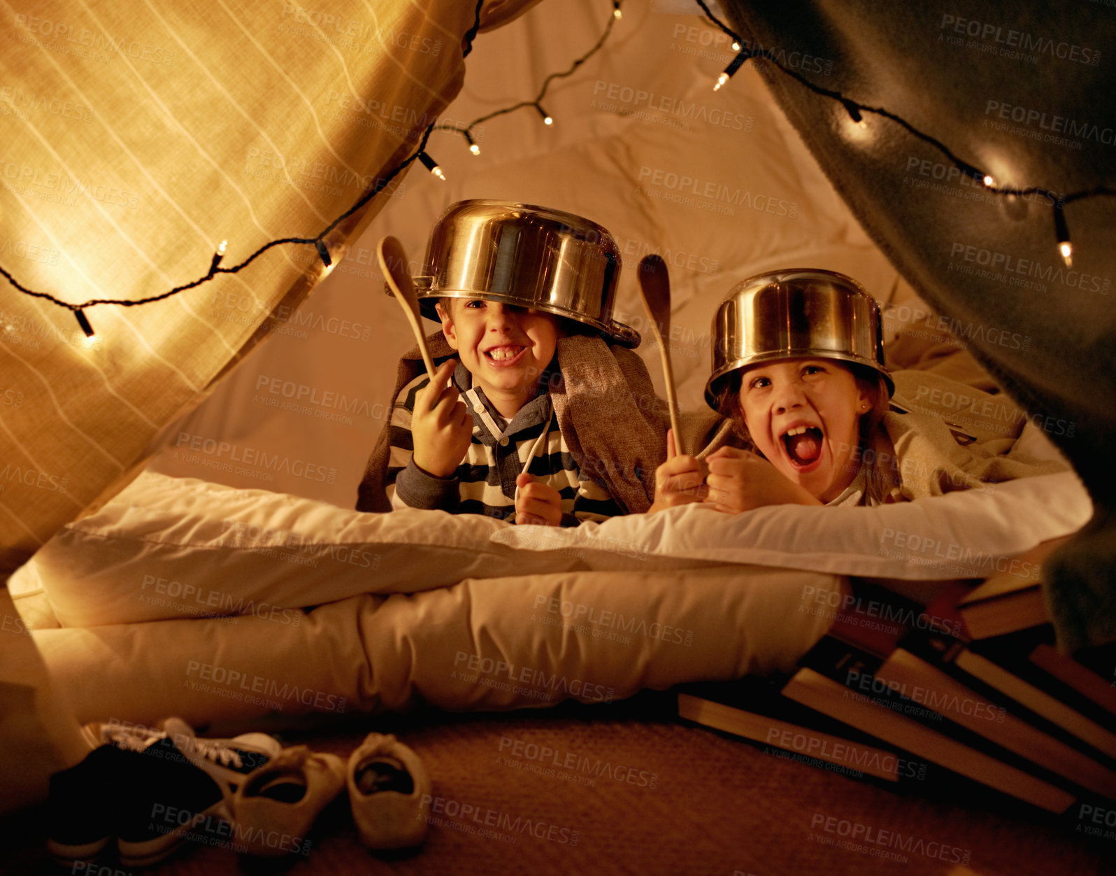 Buy stock photo Tent, lights and children at night in bedroom for playing, fun and bonding together at home. Friends, youth and happy kids with spoon, helmet pots and blanket fort for games, imagination or childhood