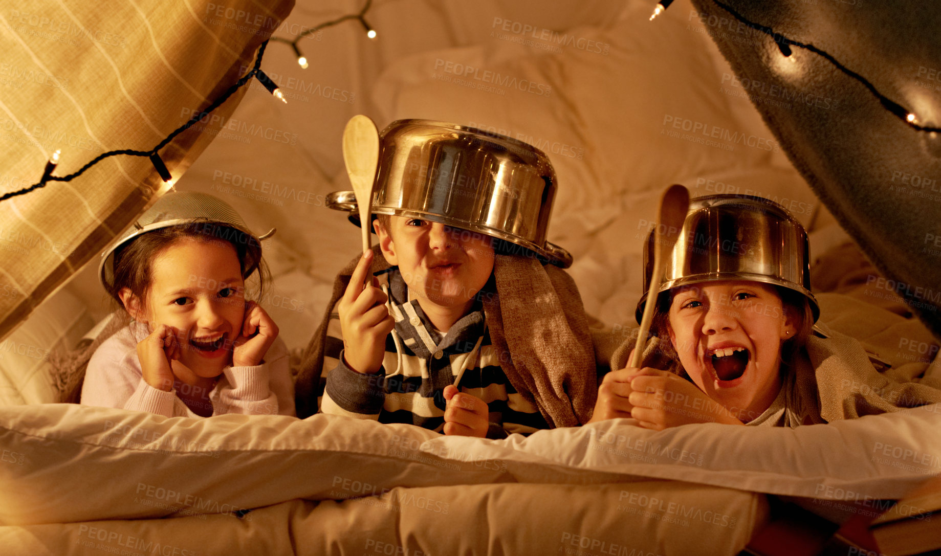Buy stock photo Tent, games and portrait of children at night in bedroom for playing and bonding together. Home, youth and happy kids with spoon, helmet pots and blanket fort for playful, imaginary and childhood fun