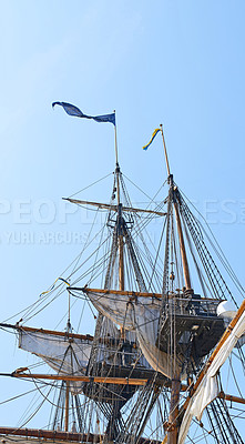 Buy stock photo Sailing, ship and mast outdoor with flag for travel, journey and adventure by blue sky in summer. Boat, wood pole and vintage schooner vessel on a cruise, rigging and transport with rope on mockup