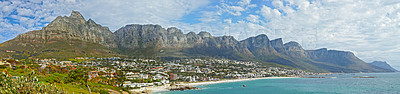 Buy stock photo Mountain, travel and city by ocean in South Africa for tourism, traveling and global destination. Landscape, background and scenic view of beach by urban town for coastline, vacation and holiday