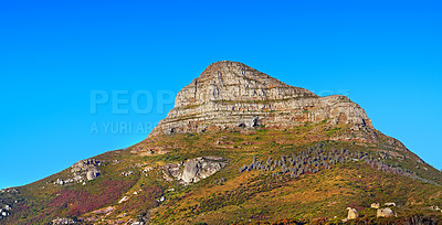 Buy stock photo Low angle, mountain and blue sky with natural landscape for travel location, outdoor adventure and environment. Banner, nature and landmark for peace, scenery and holiday destination in Cape Town.