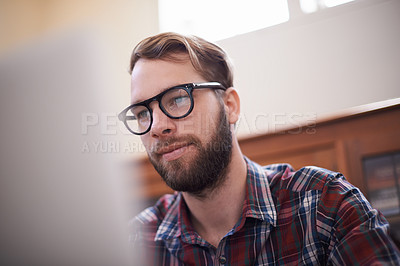 Buy stock photo Man, laptop and glasses for internet, freelancer and online or email for communication. Male person, remote work and notification in home office, reflection and browse for research on app and website