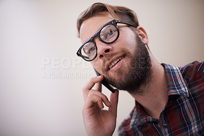 Buy stock photo Young man, face and phone call with glasses for conversation, communication or networking at home. Happy male person or freelancer with smile and mobile smartphone for friendly discussion on mockup