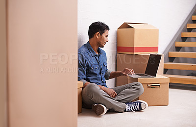 Buy stock photo Man, laptop and boxes in new house, apartment and property for moving, relocating and buying a home. Male person, real estate and mortgage for homeowner with computer, communication or technology