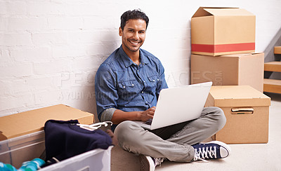 Buy stock photo Portrait, man and laptop by boxes in new house, apartment or property for moving, relocating or buying a home. Male person, real estate and mortgage for homeowner with computer, communication or tech