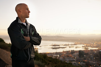Buy stock photo Man, thinking and fitness with city on mountain for sunrise, workout or outdoor exercise in nature. Male person or athlete with arms crossed in wonder or confidence for training or running on mockup
