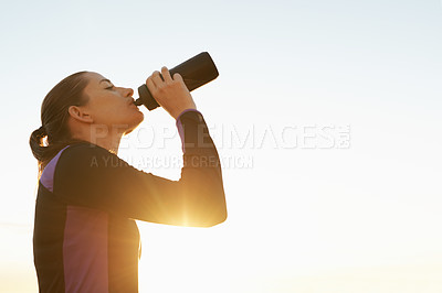 Buy stock photo Woman, fitness and drinking water with sunset for natural sustainability, break or outdoor hydration. Thirsty female person or athlete with liquid bottle after workout, exercise or training on mockup