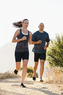 Buy stock photo Mountain, fitness and coach trail running with woman as workout or morning exercise for health and wellness. Sport, man and runner run with athlete as training in nature for sports or energy together