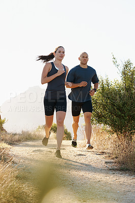 Buy stock photo Morning, fitness and couple trail running as workout or morning exercise for health and wellness together. Sport, man and woman runner run with athlete as training in nature for sports or energy