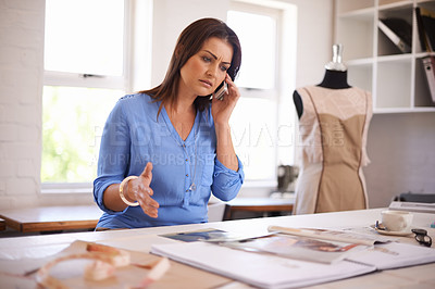 Buy stock photo Fashion designer, planning and phone call for communication, feedback and confused with clothes production. Serious tailor or entrepreneur with stress for news of a print error, mistake and catalog