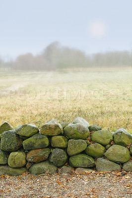Buy stock photo A stone wall on a farm