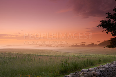 Buy stock photo A view over a farm on a misty morning