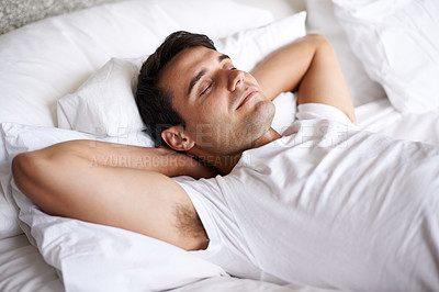 Buy stock photo Man, sleep and bed for peace, wellness and happy for rest in white top and bedroom for home and happy. Male person, relax and dreaming at house, calm and tired after day at work and taking nap 