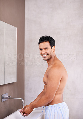 Buy stock photo Portrait, facial hygiene and water with man in bathroom for washing hands, bacteria and healthy skin. Skincare, dermatology and male person for grooming, wellness and morning routine in house.