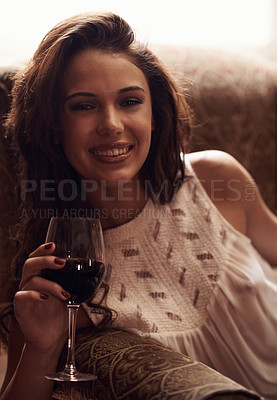 Buy stock photo Woman, portrait and armchair smile with wine to relax, home and alcohol in natural ambient light. Happy, enjoyment or liquid in glass, comfortable at house after meal in free time on weekend holiday