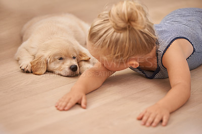 Buy stock photo Child, puppy and hug with rest, floor and pet with love at house. Kid, dog and golden retriever or sleepy labrador with sleeping, bonding and sharing together with tired look and animals or pets