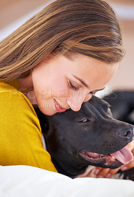 Buy stock photo Smile, woman and dog on couch for relax, love and happiness together in living room. Female person, cuddle and puppy on sofa for affection, comfort and stress relief with domestic animal in apartment
