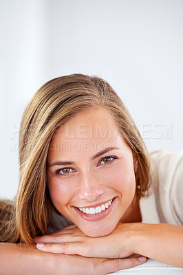 Buy stock photo Happy, woman and relax in portrait with beauty or natural makeup in home or white background. Girl, smile and model with pride, confidence and glow on face from skincare, dermatology or cosmetics