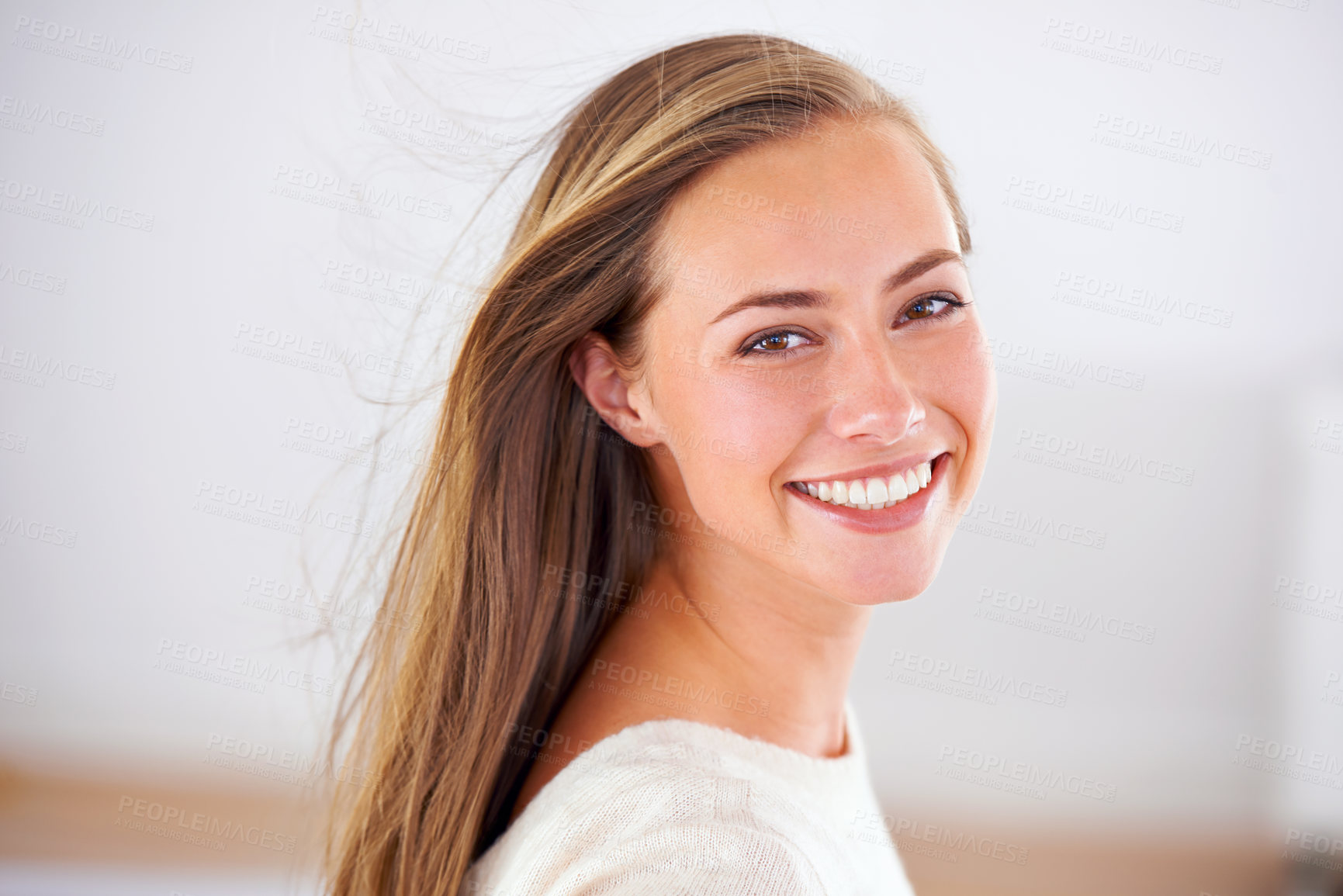 Buy stock photo Portrait of an attractive young woman giving you a bright smile