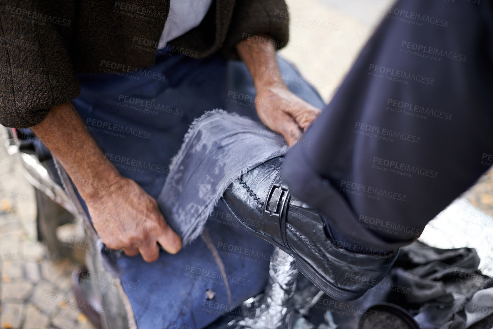 Buy stock photo Shining, shoes or hands of man in street, city or cleaning service for client or customer with polish or trade. Cloth, closeup or feet of businessman in downtown for footwear, job or outdoor help