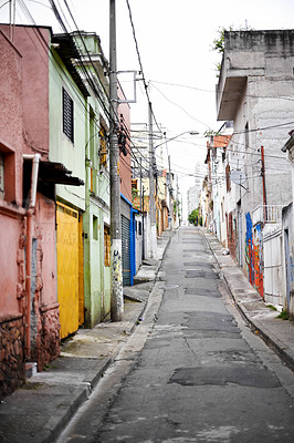 Buy stock photo Houses, barrio and street in city with architecture, color and slum with buildings on urban road. Neighborhood, favela and apartment with expansion, home and ghetto housing project in Sao Paulo