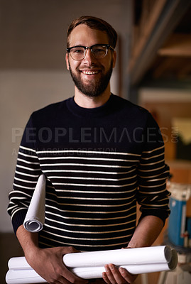 Buy stock photo Portrait, architect and man with blueprint, construction and employee in a workshop with planning for property development. Face, entrepreneur and engineer with documents and renovation with startup