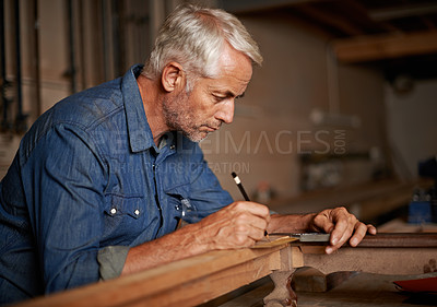 Buy stock photo Carpentry, focus and man with pencil, table and creative work at furniture manufacturing workshop. Creativity, small business and professional carpenter working on sustainable wood project design.