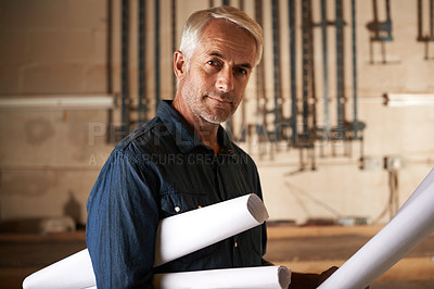 Buy stock photo Portrait, architect and senior man with blueprint, renovation and engineering in a workshop with construction. Face, entrepreneur and employee with documents and maintenance with business and startup