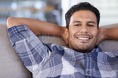 Buy stock photo Man, portrait and couch to relax in living room, smile and satisfaction with lying on weekend. Happy male person, lounge and calm or comfortable in apartment, closeup and confident for peace and sofa