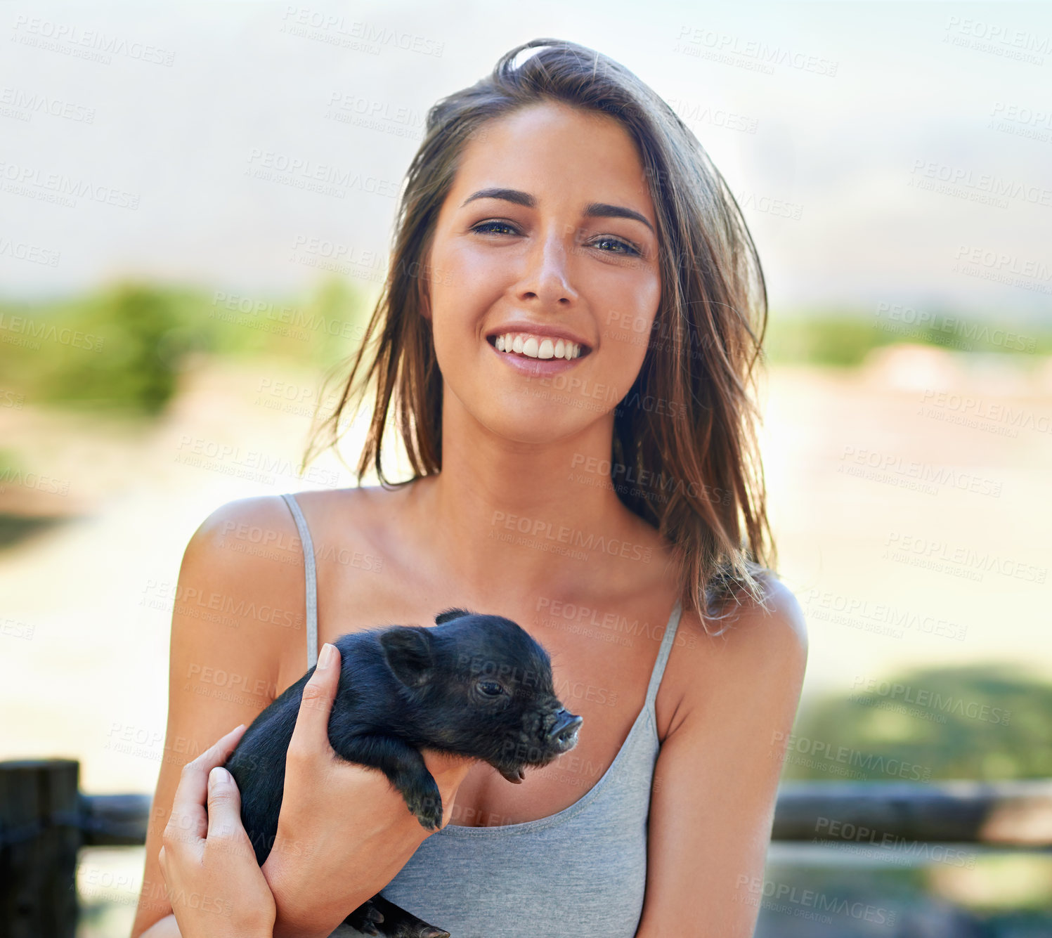 Buy stock photo Portrait, outdoor and woman with a piglet, happy and summer with weekend break and bonding together. Face, person and girl with animal and pet with sunshine and cheerful with joy, ranch and smile