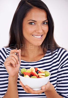 Buy stock photo Fruit, portrait and healthy eating for excited woman, bowl and happy for fresh food. Natural, nutrition and sustainable for vegetarian, fiber and breakfast or dessert for minerals and vitamins 