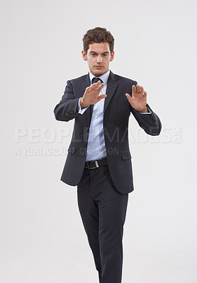 Buy stock photo Future, innovation and touchscreen with businessman user in studio on white background for metaverse access. Corporate, digital transformation and interface with young employee in suit for networking