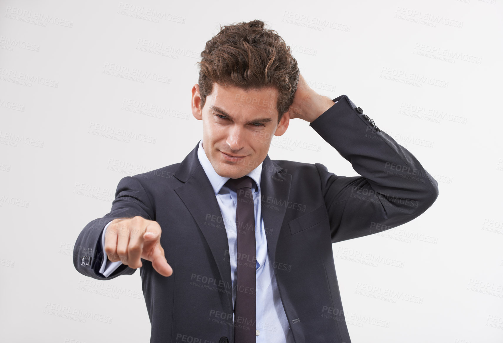 Buy stock photo Businessman, confused and hand pointing with digital interface, UI or display on a white background. Young man, user or employee in doubt or interaction on virtual technology, push or click on mockup