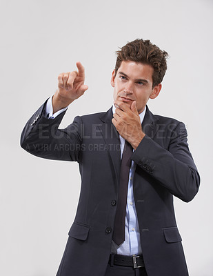 Buy stock photo Hand, thinking or businessman on touchscreen in virtual reality studio on white background for metaverse. Future, update or software system login access with finger pointing, doubt or air technology