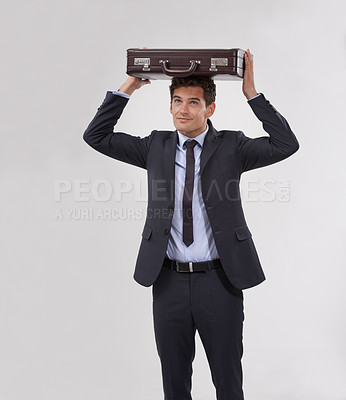 Buy stock photo Studio, business man and briefcase on head isolated on a white background mockup space. Protection, entrepreneur and professional carrying bag, consultant and corporate employee working in a suit