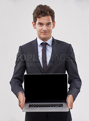 Buy stock photo Portrait, screen and man with a laptop, connection and professional on white studio background. Face, person and model with tech, internet or employee with presentation and computer with website info
